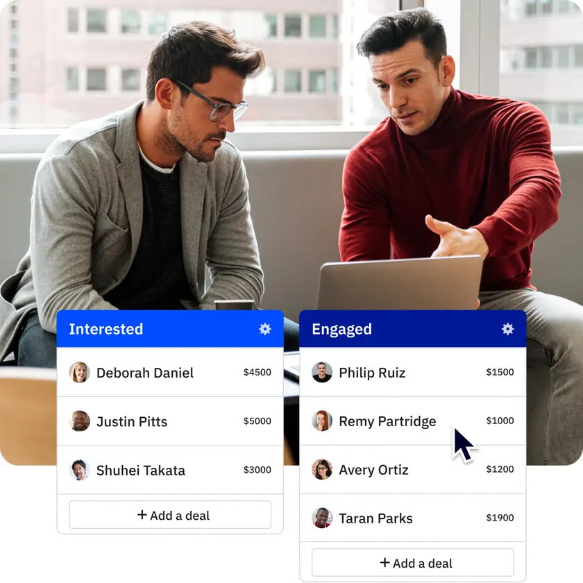 Two colleagues at a laptop above ActiveCampaign pipeline columns for interested and engaged deals