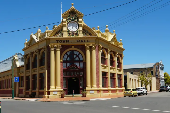 Historic town hall building with an ornate stone facade