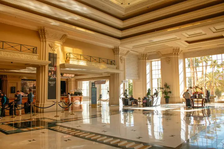 Grand hotel lobby filled with sunlight