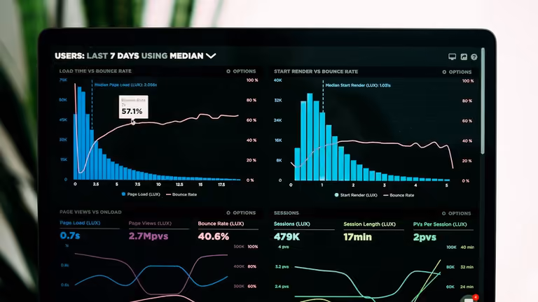 Data analytics engineer analyzing server-side tracking architecture and GA4 BigQuery telemetry on multiple monitors