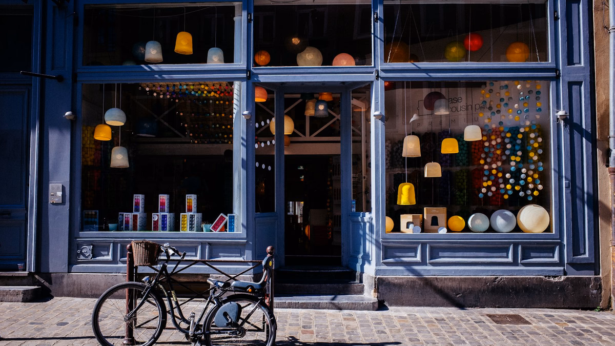 Local retail storefront exterior showcasing localized branding and physical presence in urban commercial district