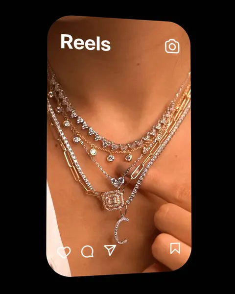 Instagram Reels ad for jewelry playing full screen on a phone