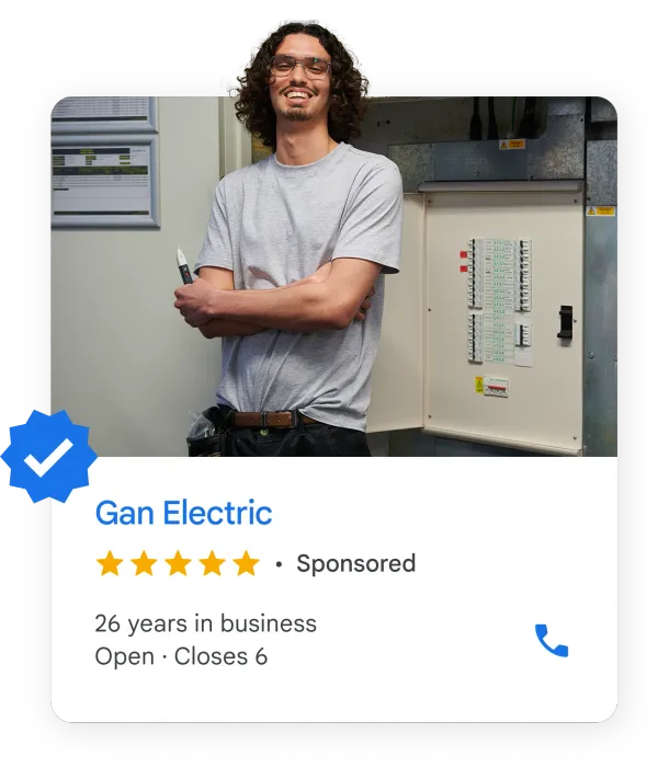 Electrician beside an open breaker panel, above a Local Services ad card with the Google Verified badge