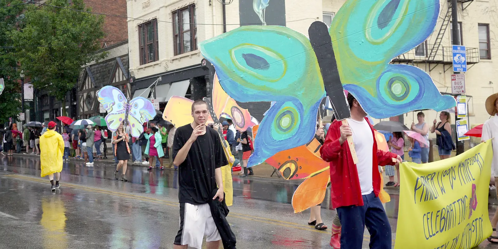 Community parade marchers and festive crowds celebrating holiday traditions in North Carolina