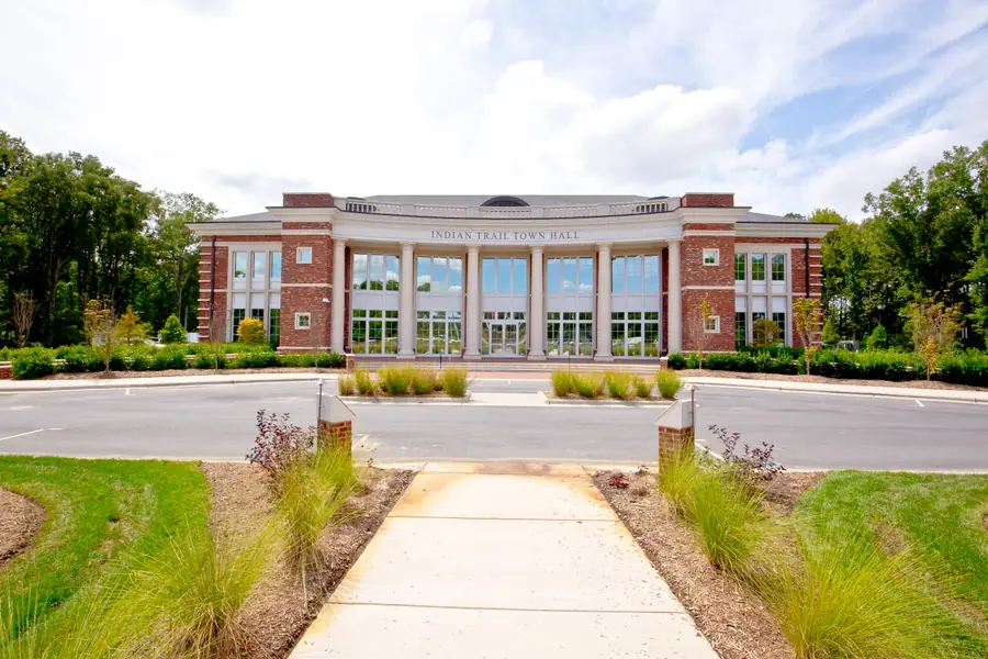 Exterior front entrance and brick portico of Indian Trail Town Hall in Union County, North Carolina