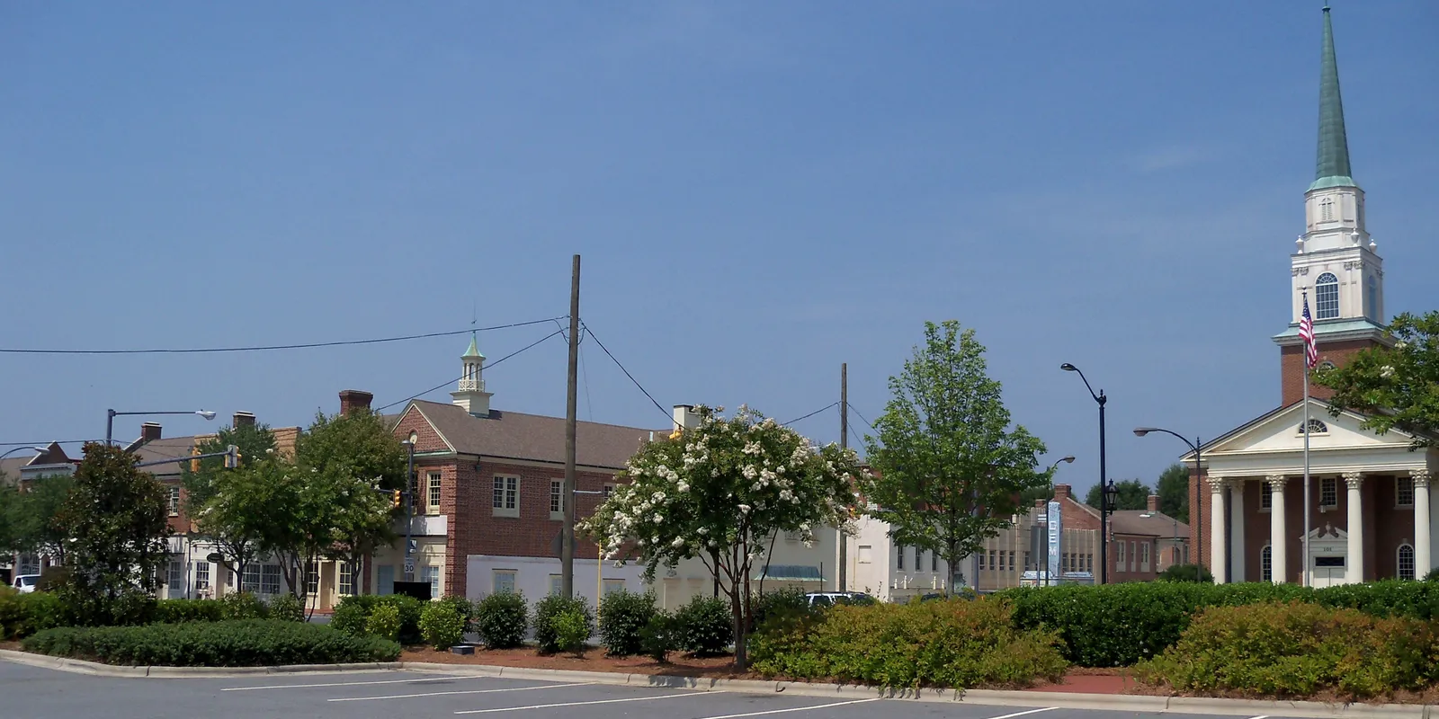 Downtown streetscape with church steeple along North Main Street in Kannapolis, North Carolina