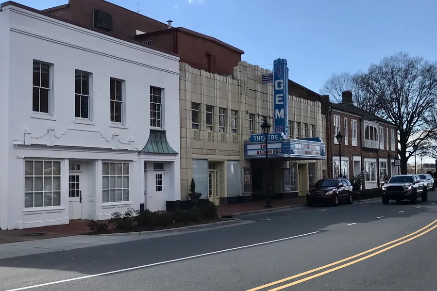 Historic Gem Theatre neon marquee and Art Deco entrance on 1st Street in downtown Kannapolis, North Carolina
