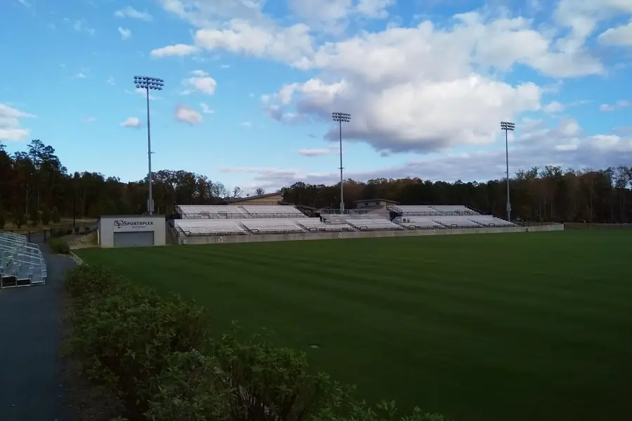 Modern 5,000-seat sports stadium and manicured natural grass field at the Sportsplex at Matthews