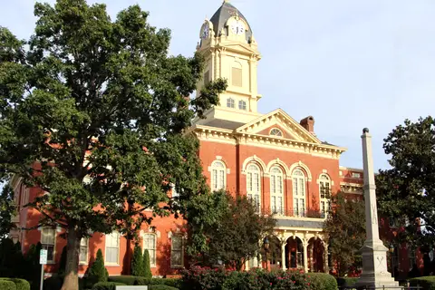 Historic Union County Courthouse with clock tower and manicured lawn in downtown Monroe, North Carolina