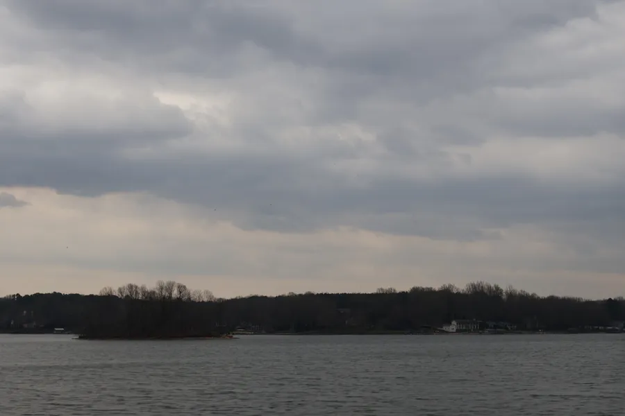 Open waters and shoreline vegetation along Lake Norman viewed from Cornelius Road in Mooresville, North Carolina