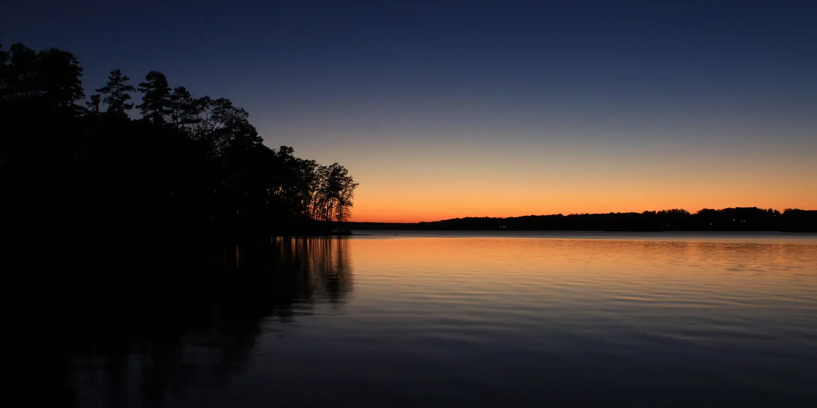 Scenic lake waters and shoreline foliage at Badin Lake in the Uwharrie National Forest near Albemarle