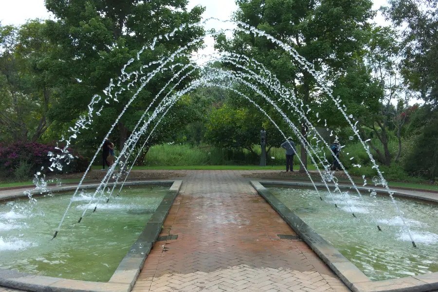 Scenic outdoor fountain and manicured botanical walkways at Daniel Stowe Botanical Garden near Belmont, North Carolina