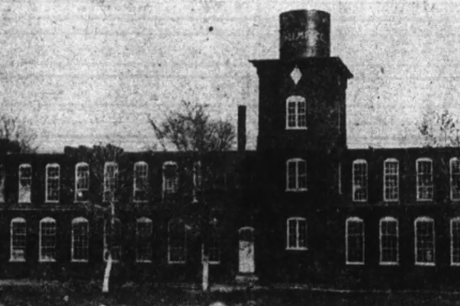 Historic brick architecture of the Cherryville Manufacturing Company textile mill facility, representing Cherryville's industrial expansion
