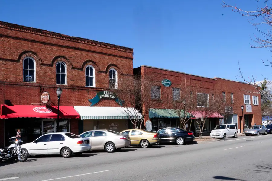 Historic brick commercial storefronts and streetscape in downtown Clover, South Carolina