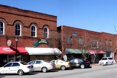 Historic brick storefronts along Main Street in the downtown historic district of Clover, South Carolina