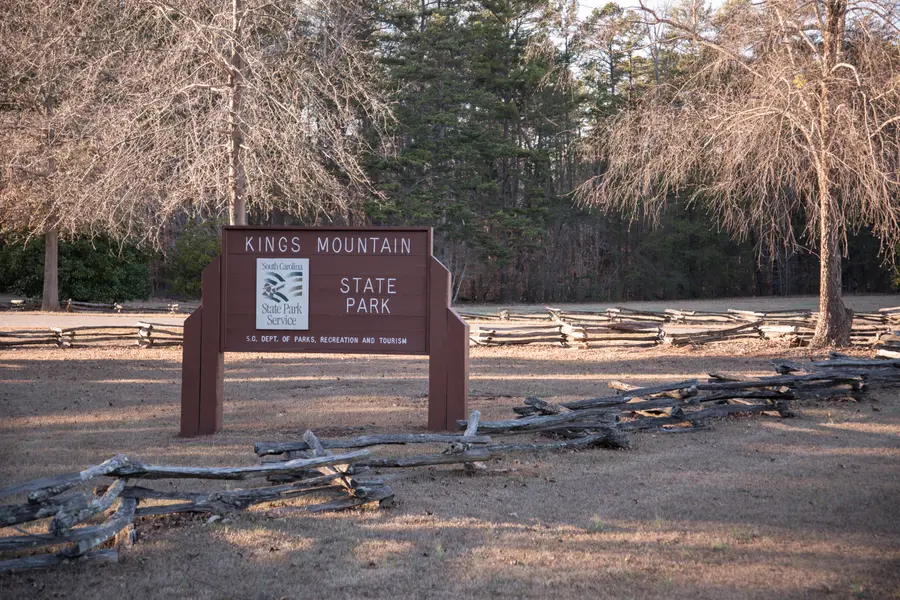 Scenic wooded entrance and outdoor recreation trails at Kings Mountain State Park near Clover