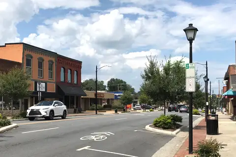 Downtown commercial storefronts and streetscape along 1st Avenue in Conover North Carolina