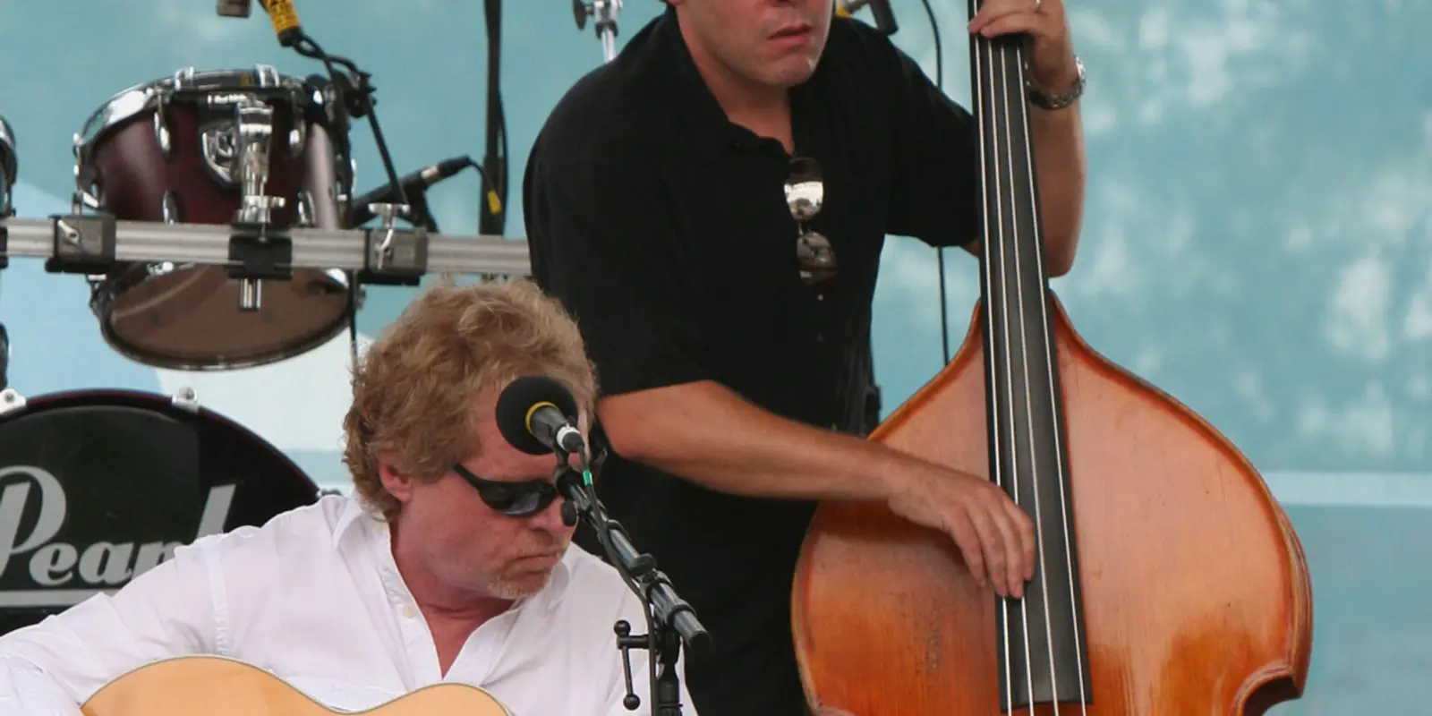 Live jazz musicians performing onstage during outdoor Carolinas music festival