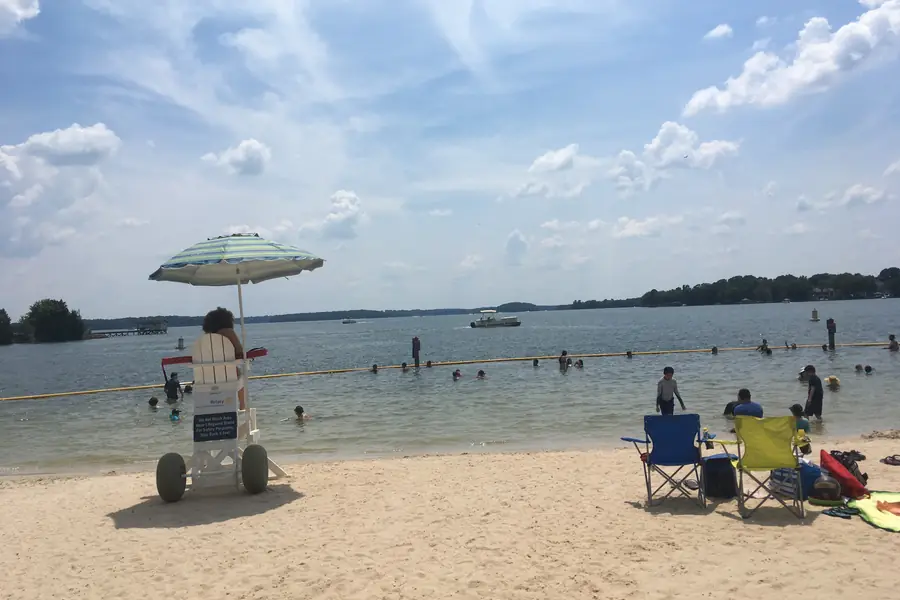 Sandy swimming beach and open water vista at Ramsey Creek Beach in Cornelius, North Carolina