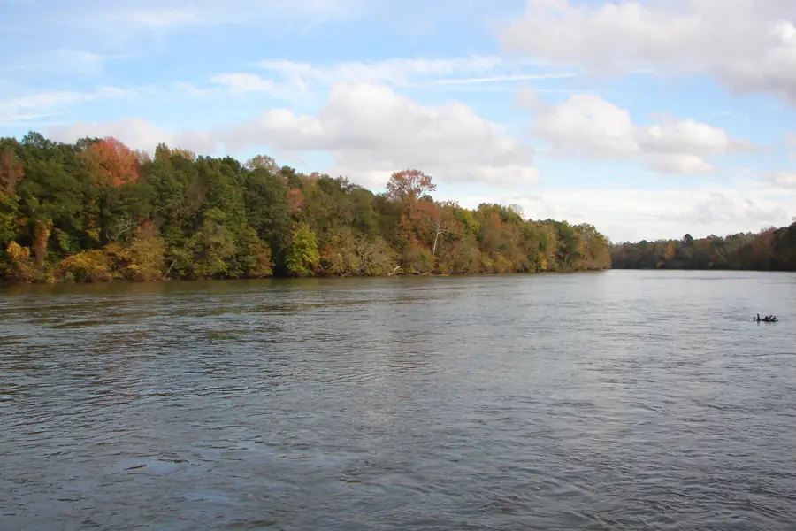 Calm river waters and lush forested shoreline along the Catawba River in York County