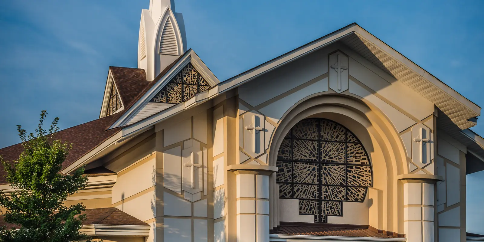Sanctuary facade of Providence Baptist Church during community gathering in Harrisburg, North Carolina