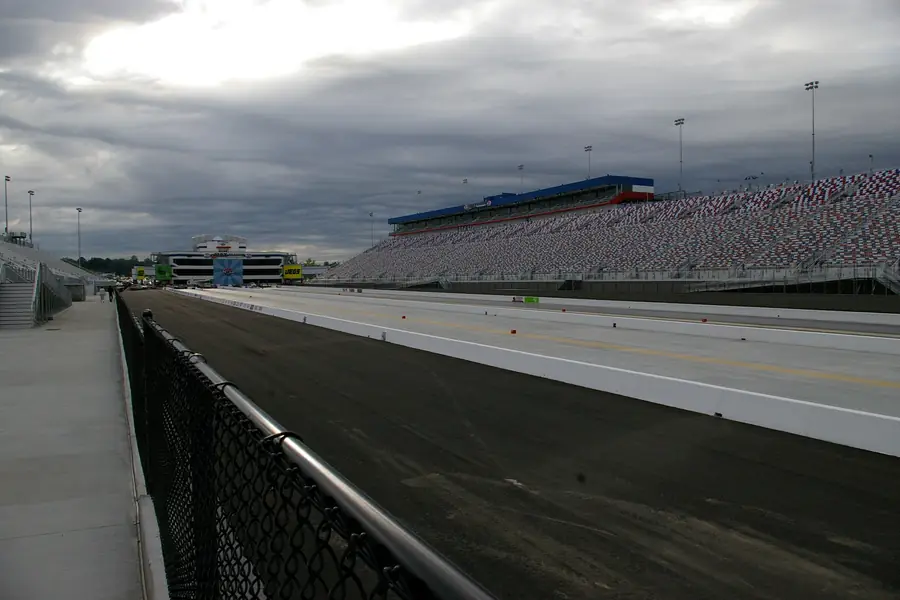 Four-lane drag racing surface and timing tower at zMAX Dragway in the Harrisburg and Concord commercial area