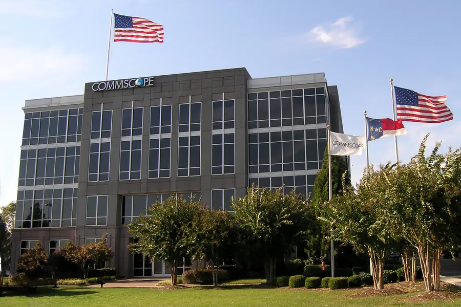Modern corporate campus building and entrance sign of CommScope Corporate Headquarters in Hickory