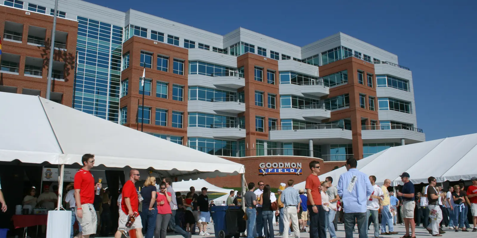Visitors sampling regional beverages at an outdoor craft festival in North Carolina