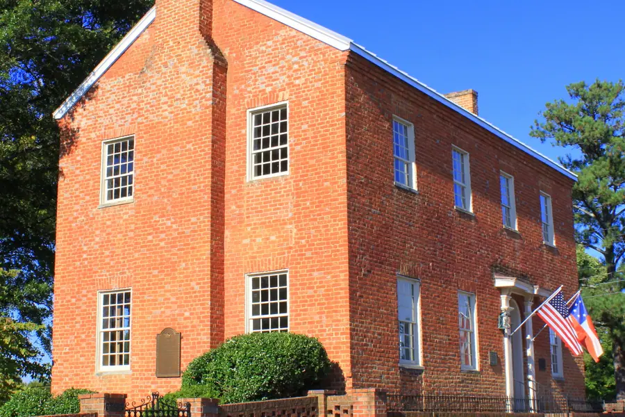 Historic brick exterior of the 1813 Pleasant Retreat Academy in Lincolnton, North Carolina