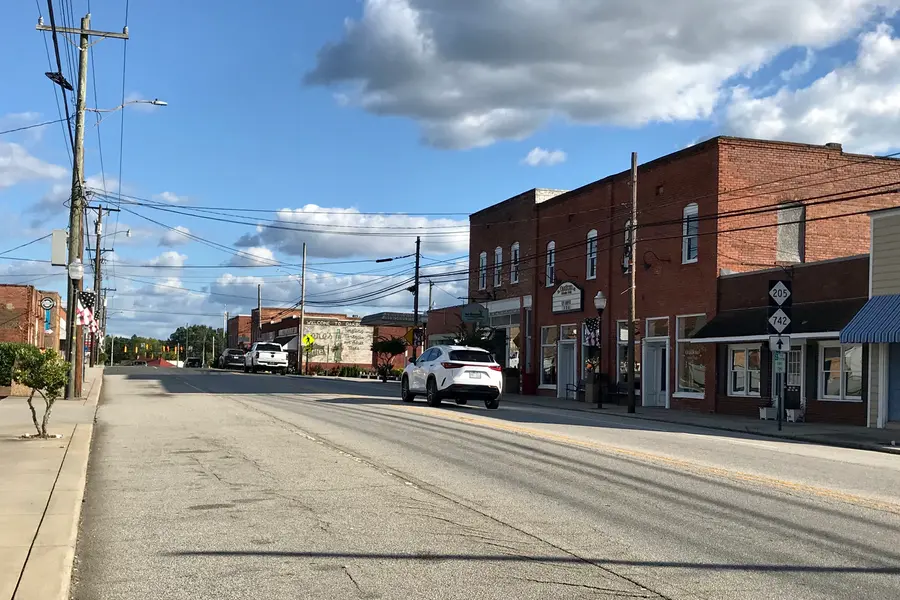 North Main Street commercial storefronts and sidewalks in historic downtown Oakboro in western Stanly County