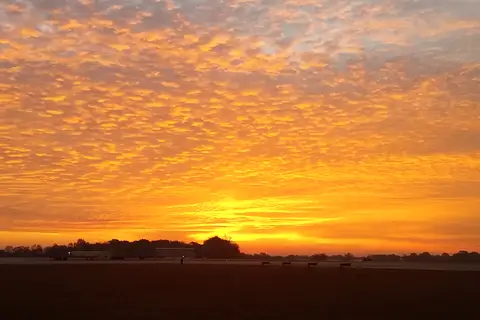 Scenic sunset across the rolling foothills and horizon of Catawba County near Long View