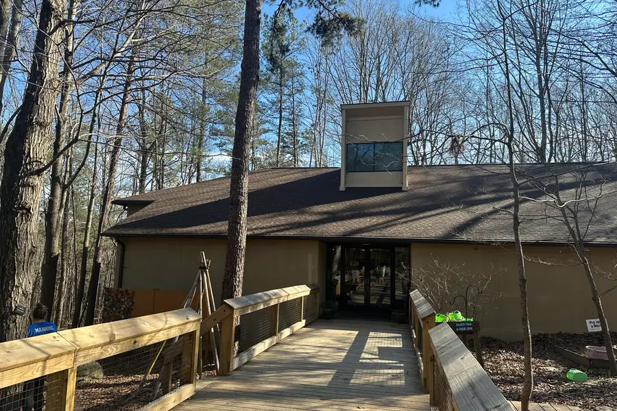 Wooded park trail and nature center facility in eastern Mecklenburg County serving Mint Hill