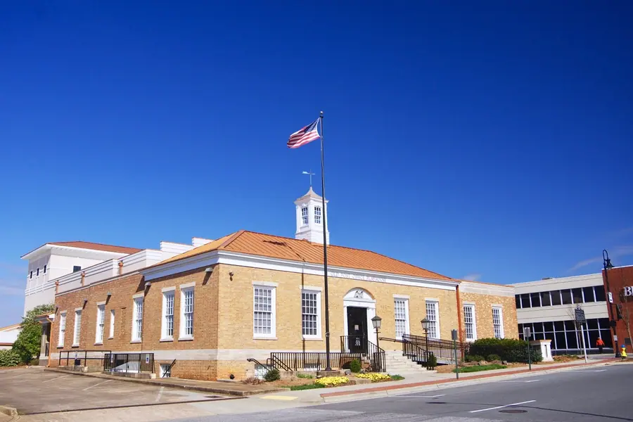 Historic brick Old Post Office Playhouse building housing The Green Room Community Theatre in Newton, North Carolina