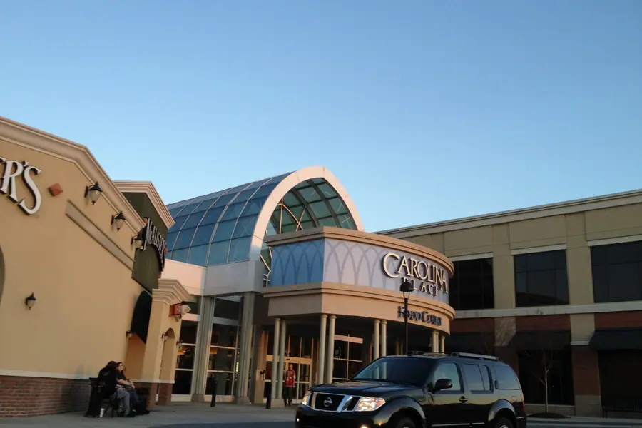 Exterior entrance and retail architecture of Carolina Place Mall in Pineville, North Carolina