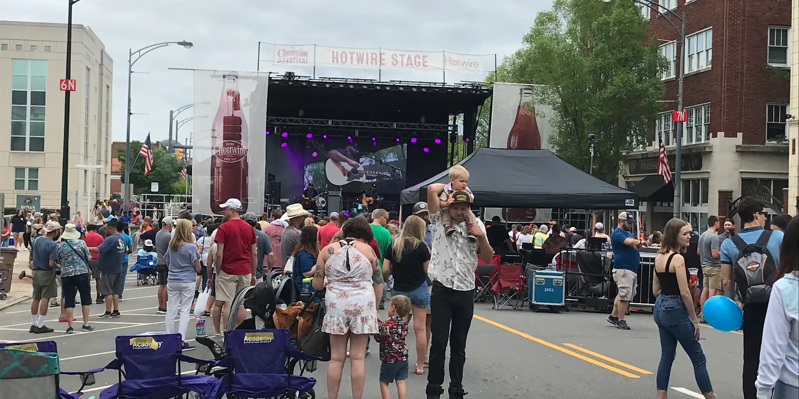 Festival attendees and merchant booths lining historic commercial streets in Salisbury NC
