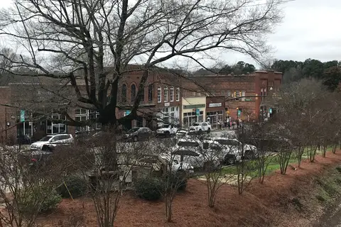 Downtown Waxhaw historic storefronts and active commercial streetscape along South Main Street in Waxhaw, North Carolina