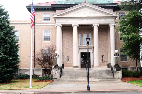 Historic neoclassical columns and clock tower of the York County Courthouse in downtown York, South Carolina