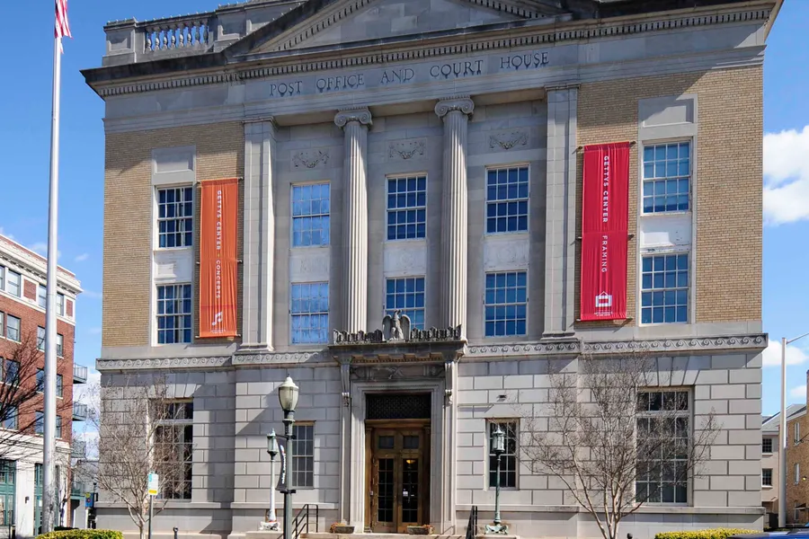 Neoclassical stone facade and columns of the historic federal building and post office in Rock Hill, South Carolina
