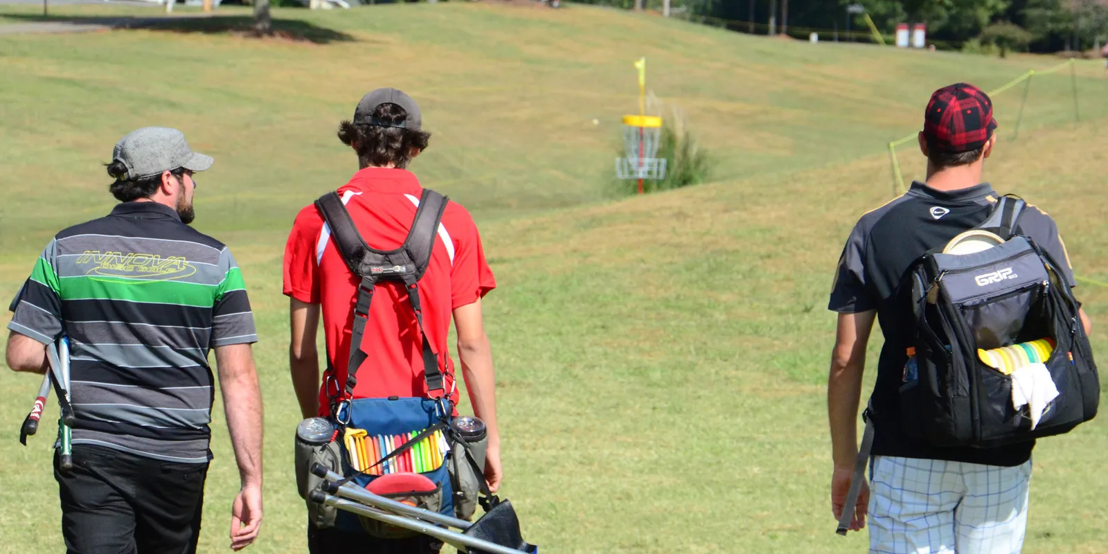 Competitors walking the fairway of hole 11 at the Winthrop Arena Course during the United States Disc Golf Championship