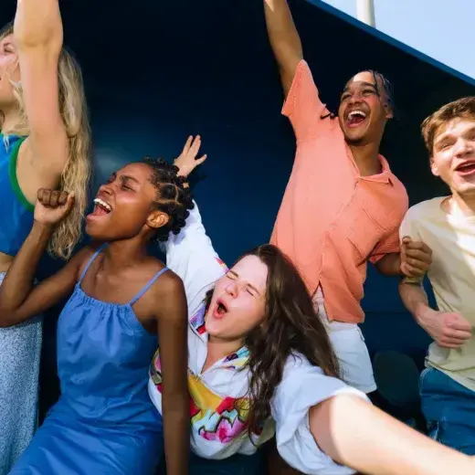 Group of friends cheering together