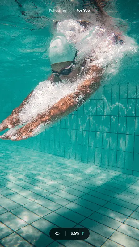 Swimmer underwater shown as a TikTok video ad with a return on investment label